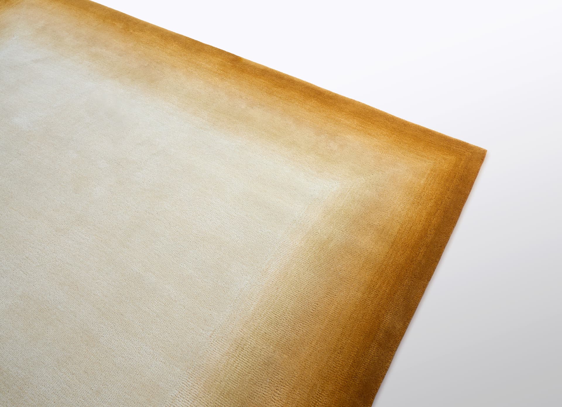 Mohebban
DAWN GOLD
Handmade rug — 2