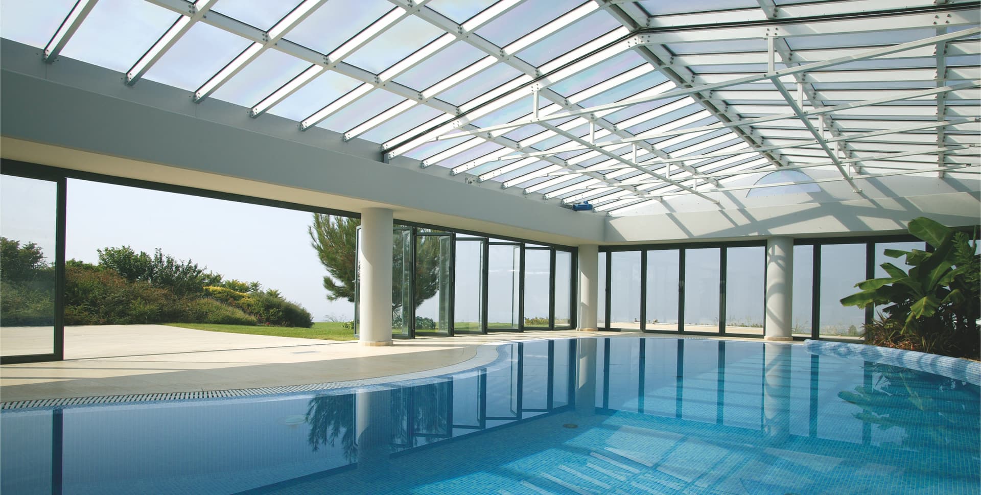 Alumil
SMARTIA M19800
Folding glass and aluminium glass facade