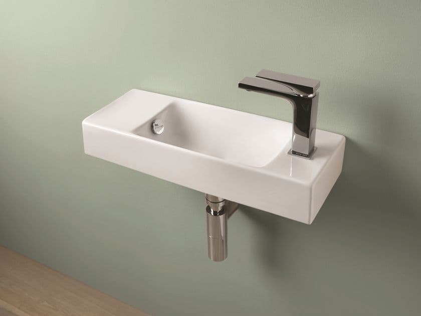 Artceram
BRICK
Rectangular wall-mounted ceramic handrinse basin