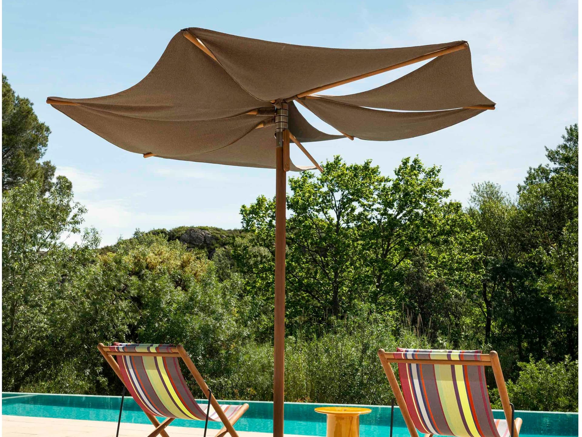 Calma
OM
Round stainless steel and wood Garden umbrella