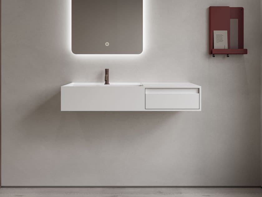 Copenhagen Bath
MODUL 100 WITH DRAWER
Rectangular wall-mounted washbasin in Acovi® with drawer