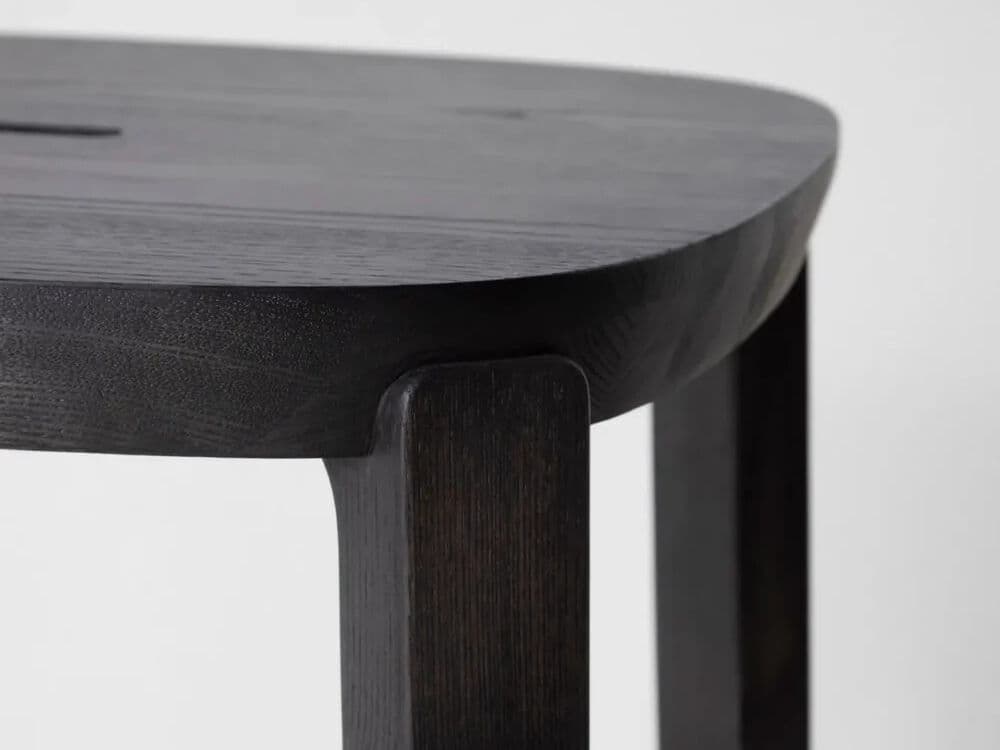 District Eight
COLLETTE
Backless low wooden stool