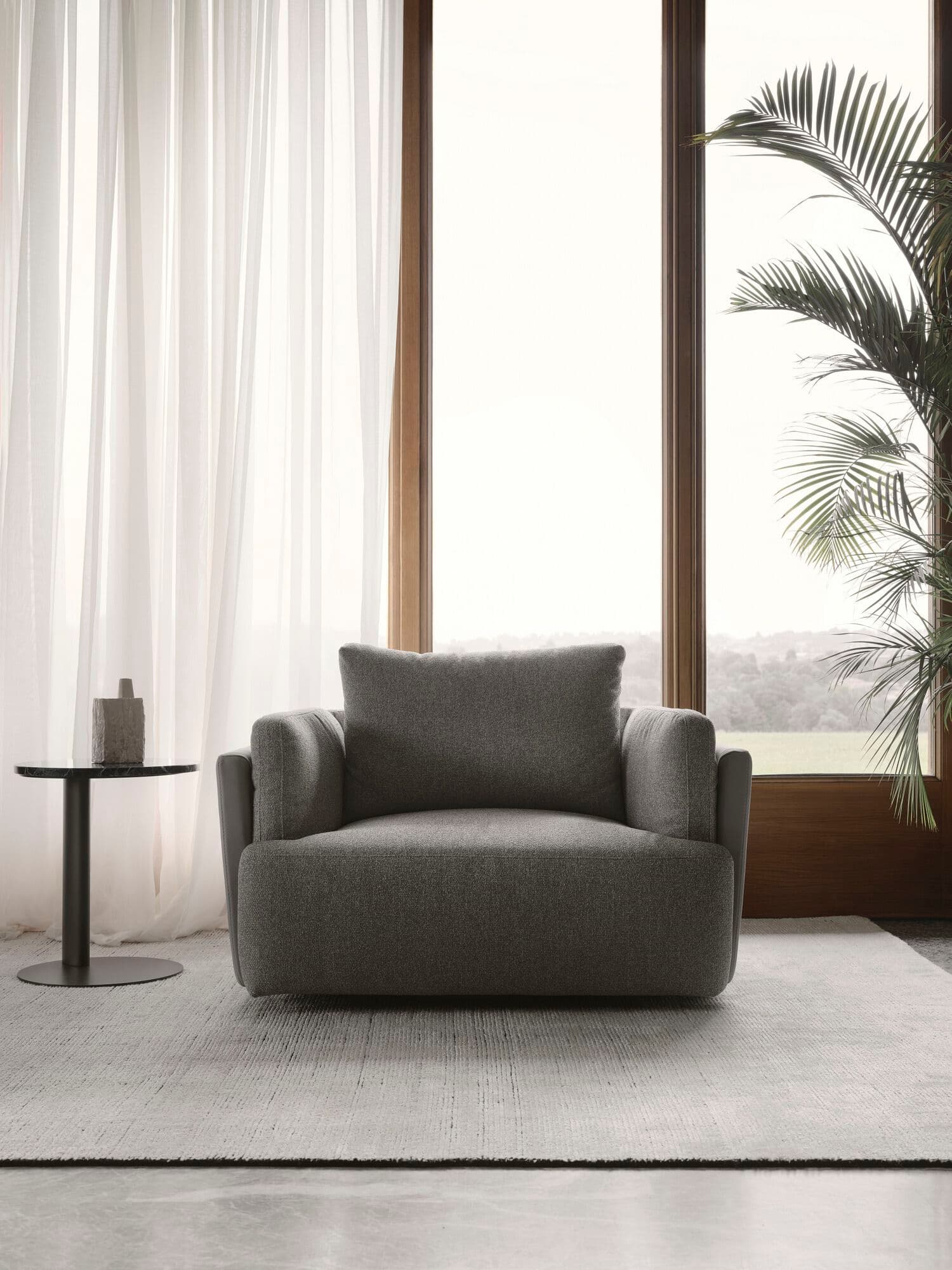 NICOLINE
SUNSET SWIVEL
Swivel leather armchair with armrests