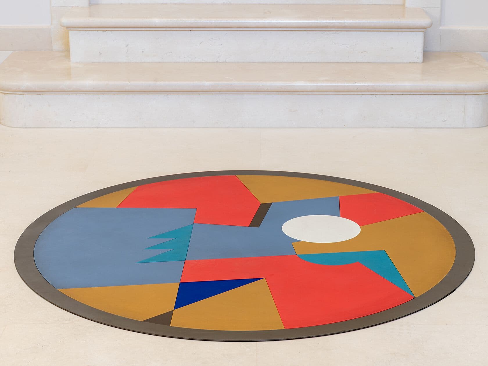 Officine Tamborrino
OCEAN
Round metal rug with geometric shapes